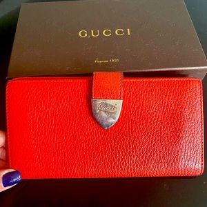 Gucci coral colored large snap closure wallet